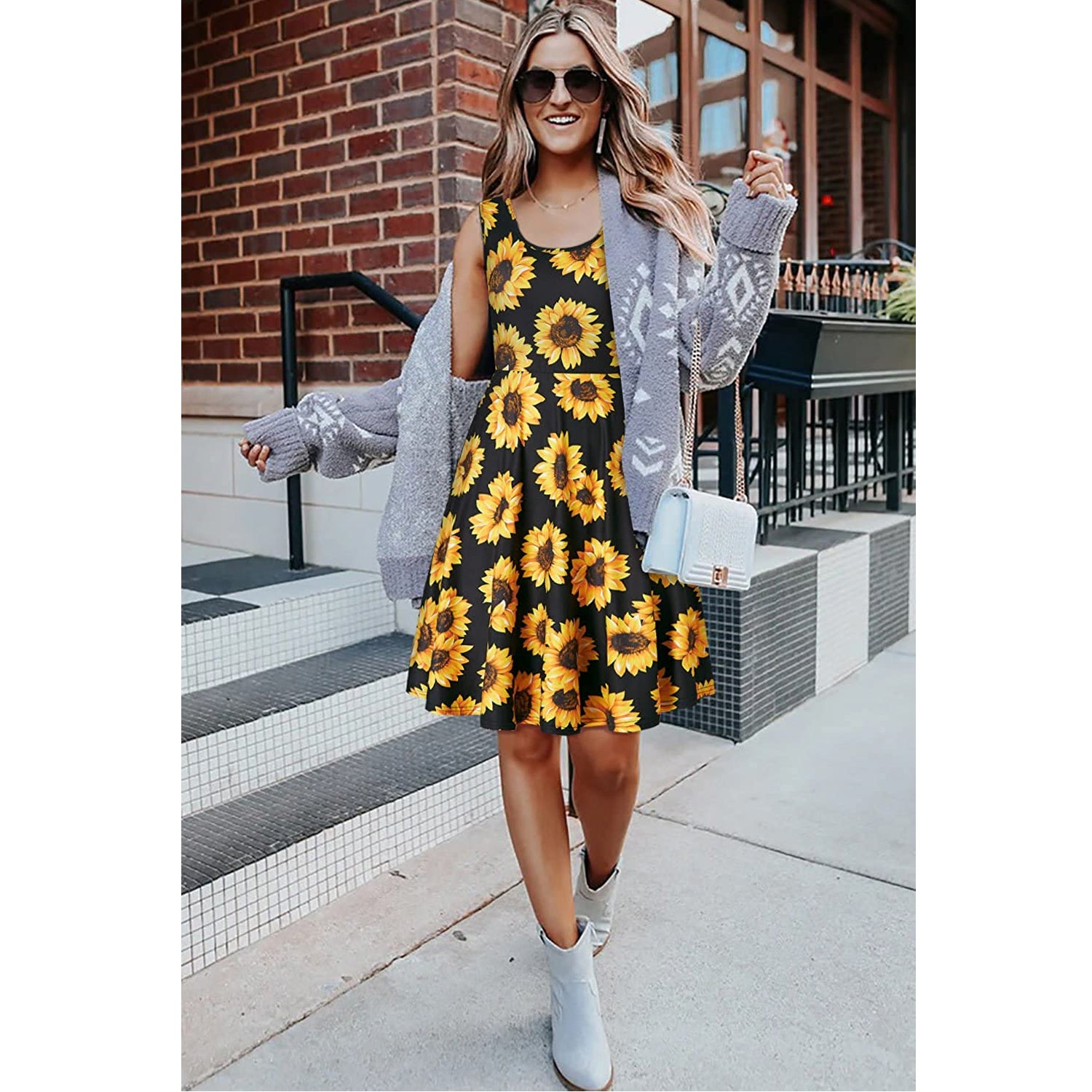 day dress in lemon yellow cotton with stylized sunflower print Vintage Summer Sunflower Print Sleeveless Maxi Dress with Hatler Neck and boho swing Detail