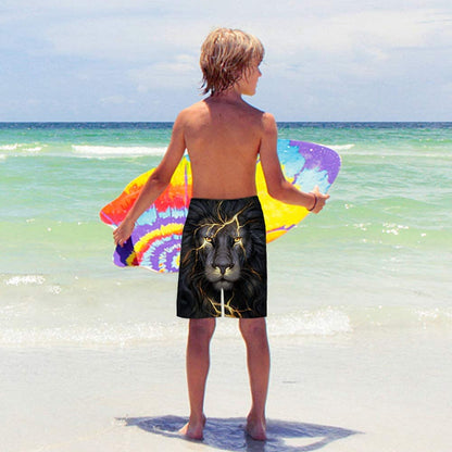 Gelbe Badehose für Jungen mit lustigem Löwenmotiv